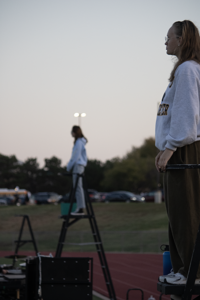 Drum Majors conduct the drumline.